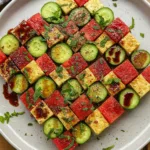 Checkerboard Salad with watermelon, cucumber, and feta on a summer platter